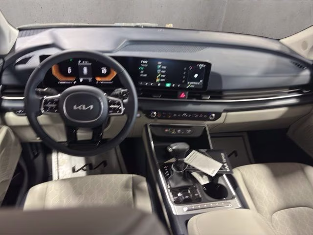 2026 Ceramic Silver Kia Carnival EX FWD Van