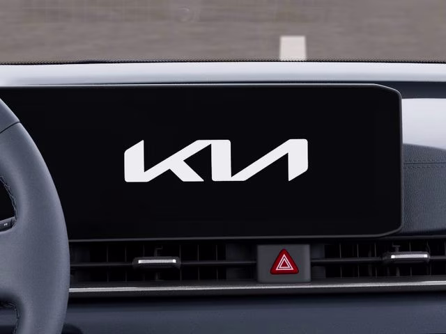 2026 Ceramic Silver Kia Carnival EX FWD Van
