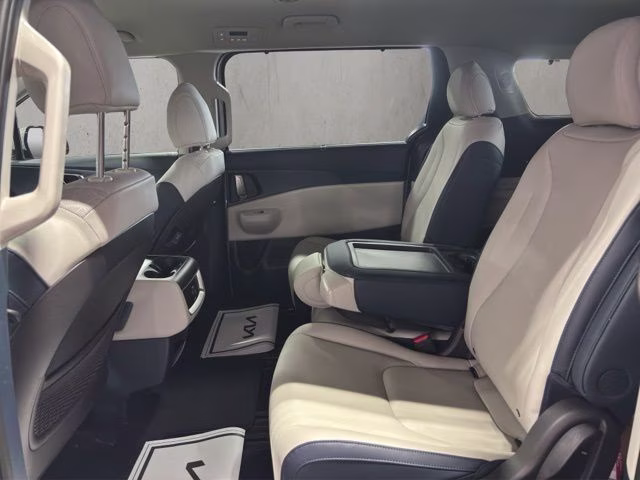 2026 Ceramic Silver Kia Carnival EX FWD Van