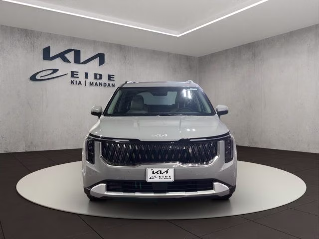 2026 Ceramic Silver Kia Carnival EX FWD Van