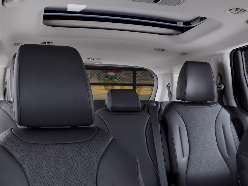2026 Astra Blue Kia Carnival SX FWD Van