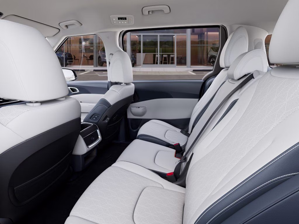 2026 Ceramic Silver Kia Carnival EX FWD Van