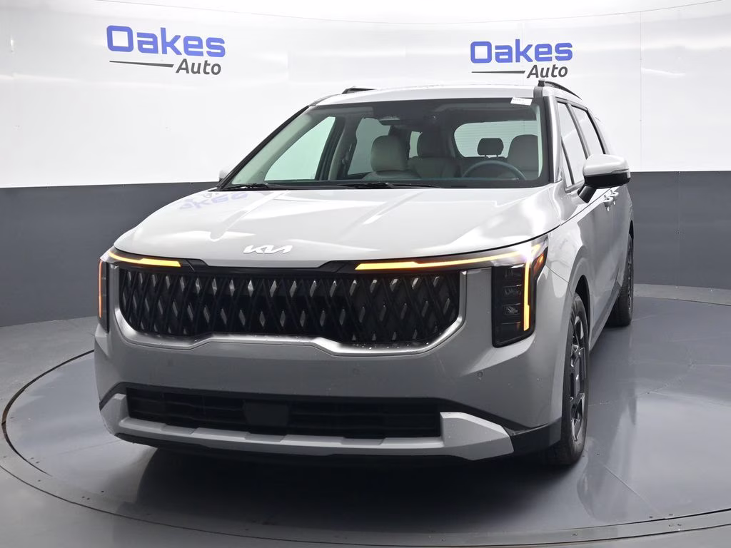 2026 Ceramic Silver Kia Carnival EX FWD Van