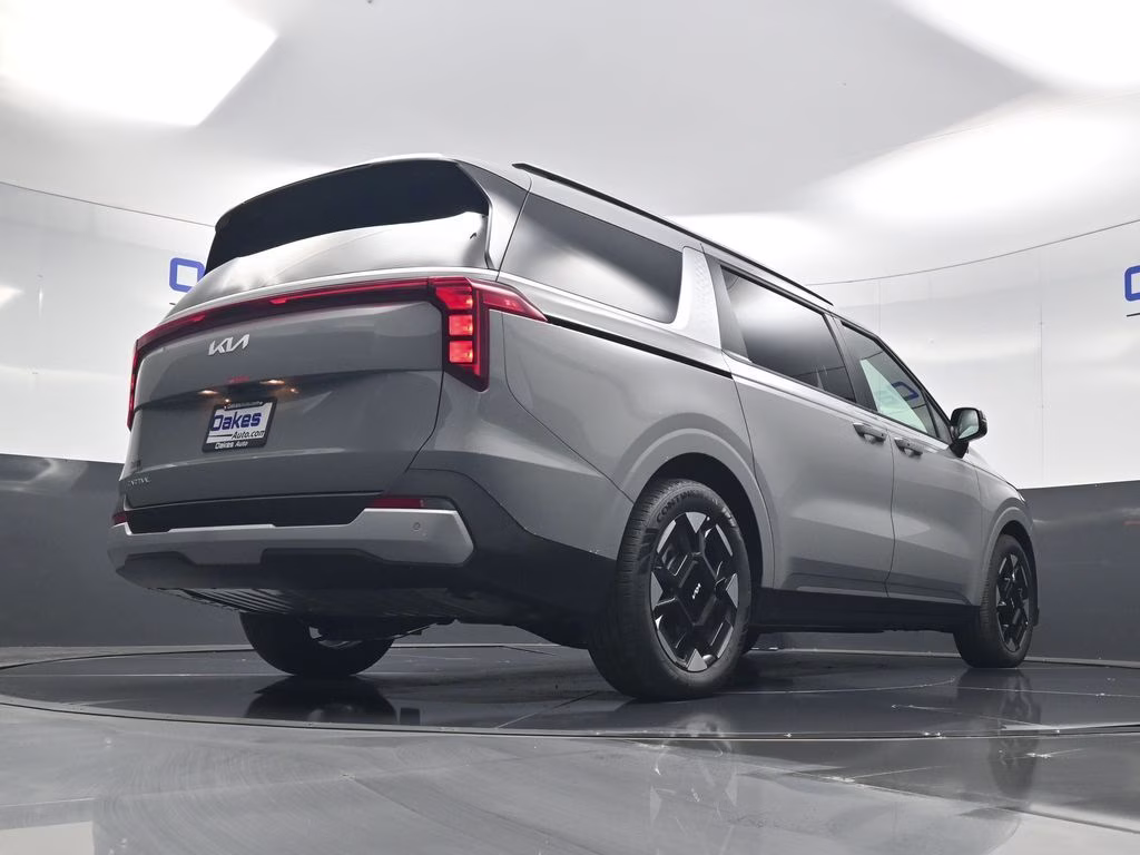 2026 Ceramic Silver Kia Carnival EX FWD Van