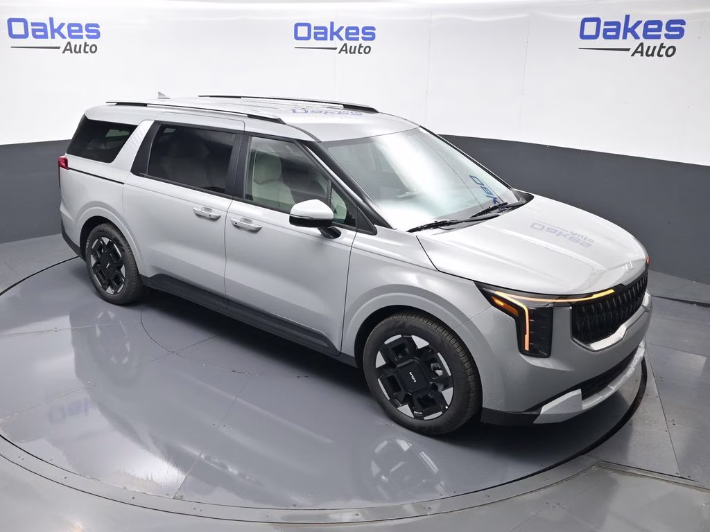 2026 Ceramic Silver Kia Carnival EX FWD Van