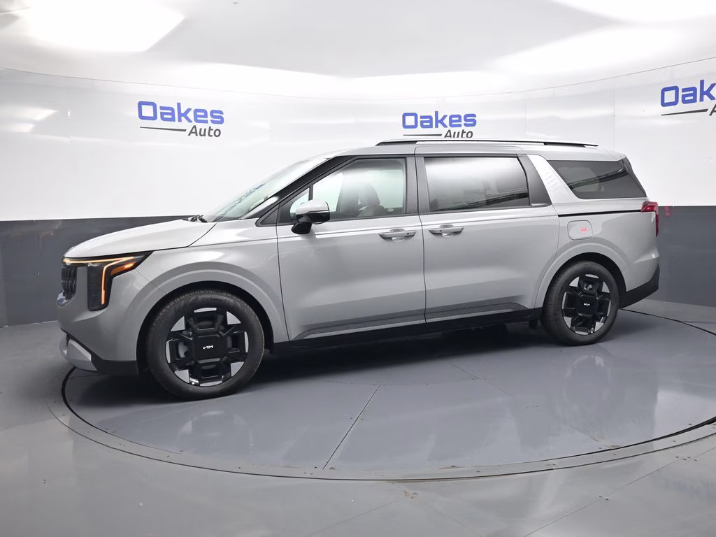 2026 Ceramic Silver Kia Carnival EX FWD Van