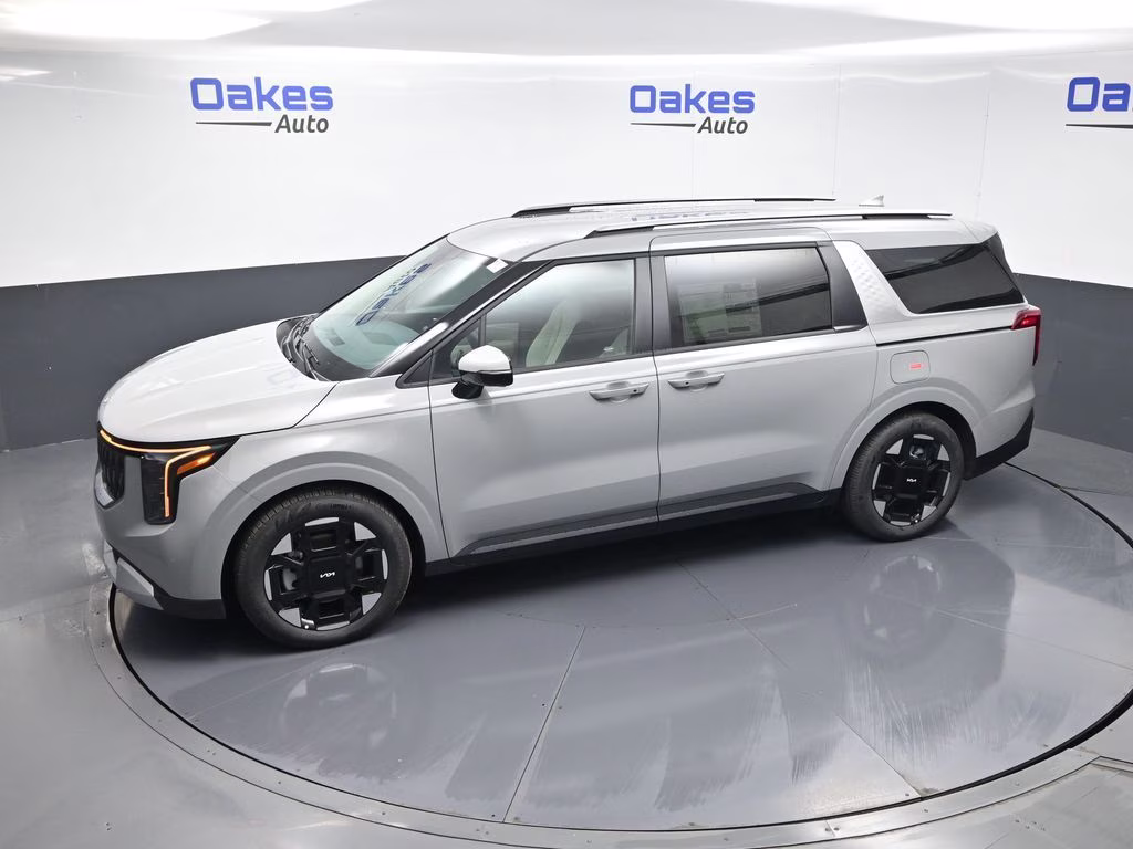 2026 Ceramic Silver Kia Carnival EX FWD Van