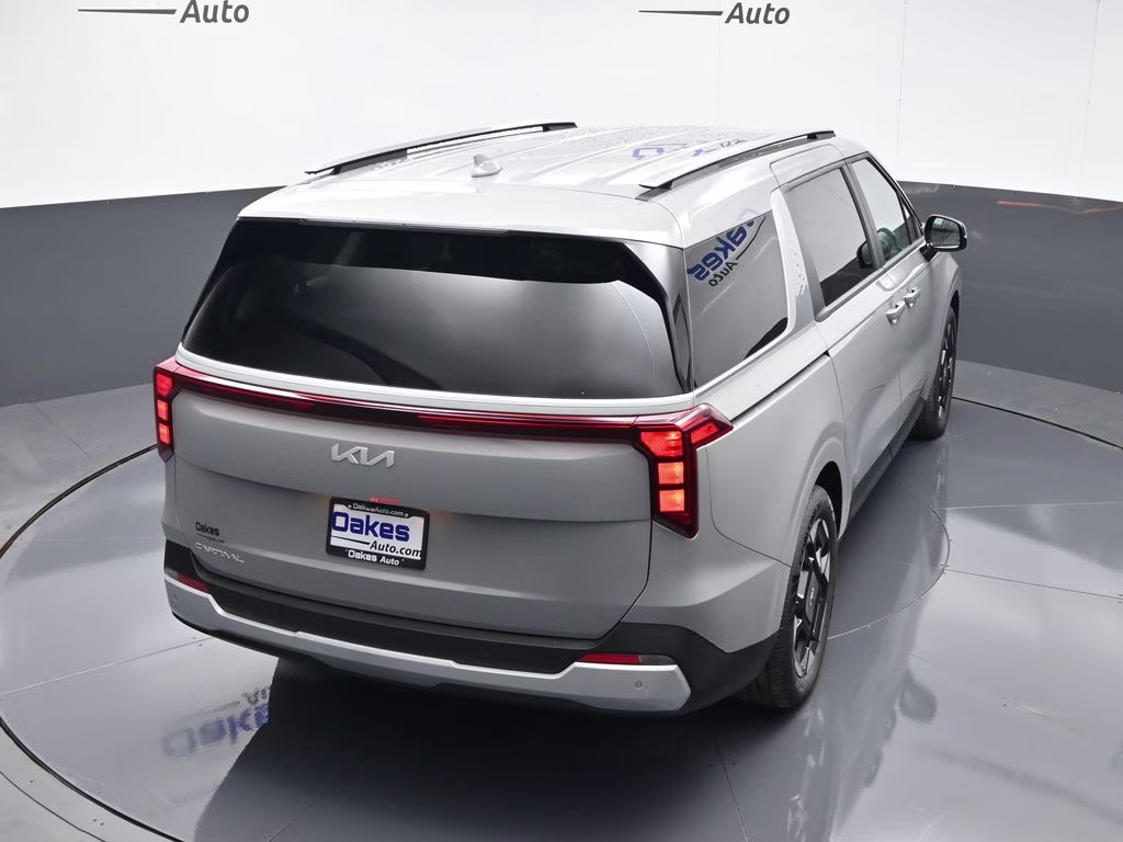 2026 Ceramic Silver Kia Carnival EX FWD Van