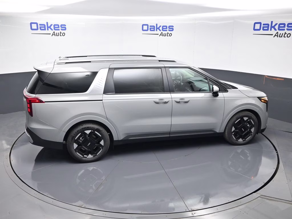 2026 Ceramic Silver Kia Carnival EX FWD Van