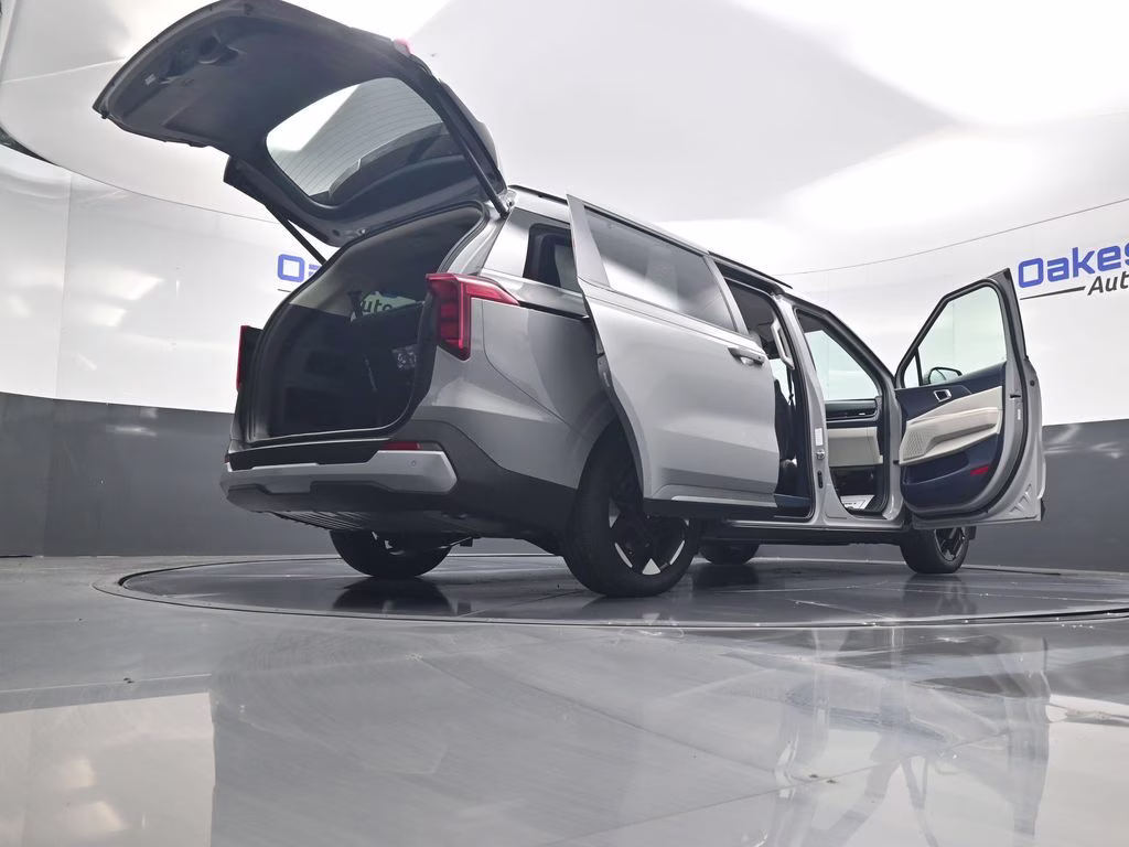 2026 Ceramic Silver Kia Carnival EX FWD Van