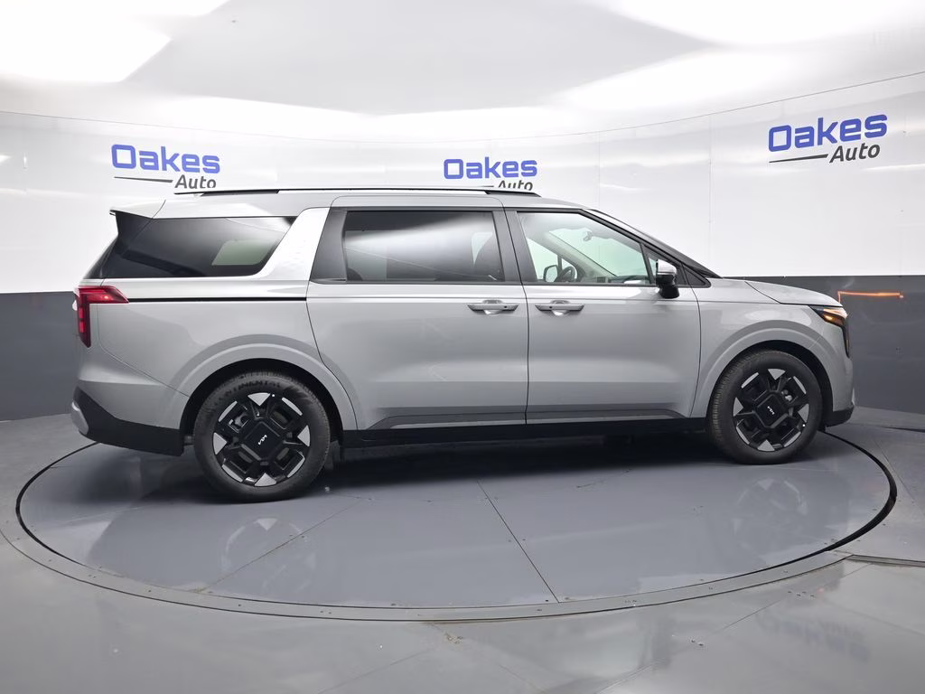 2026 Ceramic Silver Kia Carnival EX FWD Van