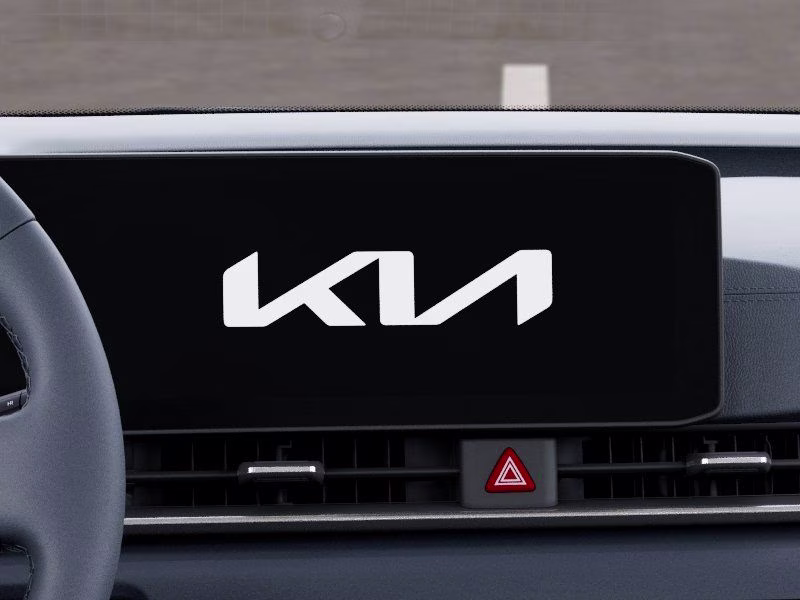 2026 Ceramic Silver Kia Carnival EX FWD Van