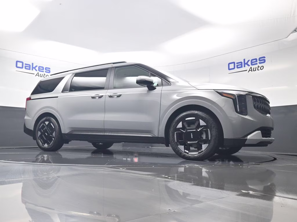 2026 Ceramic Silver Kia Carnival EX FWD Van