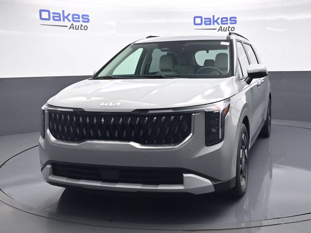 2026 Ceramic Silver Kia Carnival EX FWD Van
