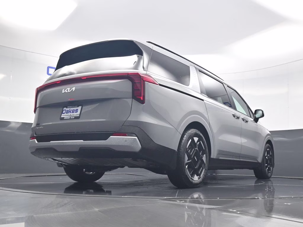 2026 Ceramic Silver Kia Carnival EX FWD Van