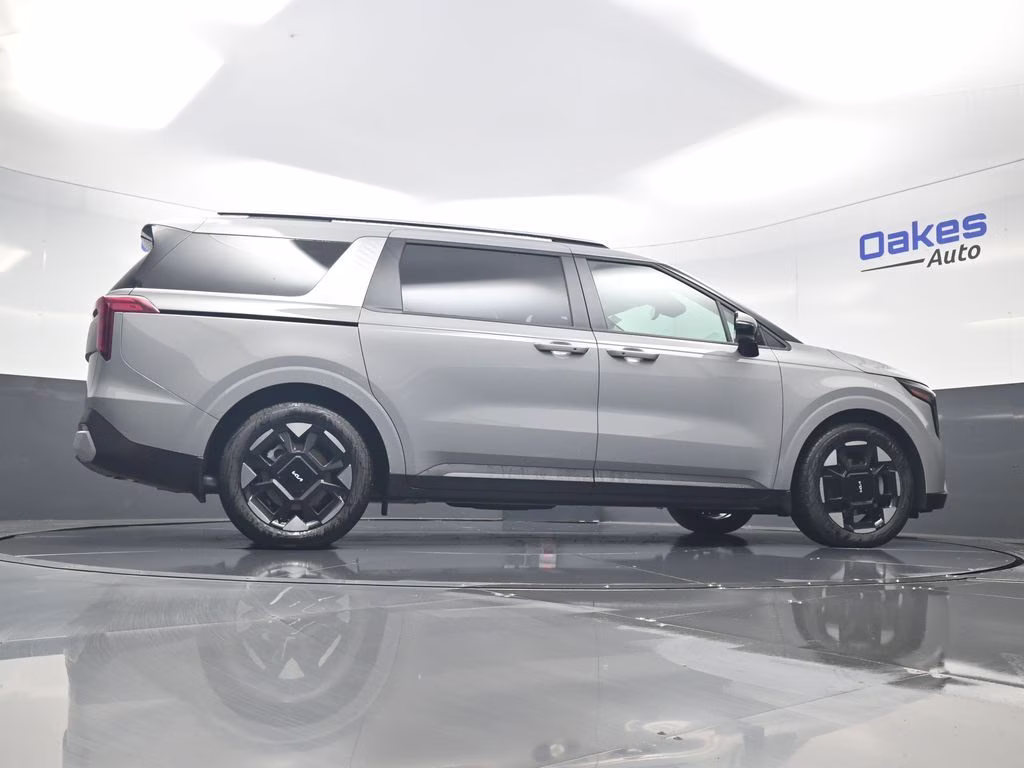 2026 Ceramic Silver Kia Carnival EX FWD Van
