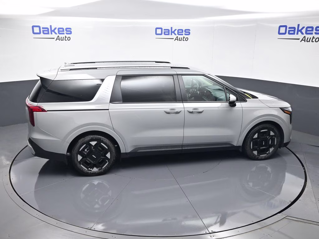 2026 Ceramic Silver Kia Carnival EX FWD Van