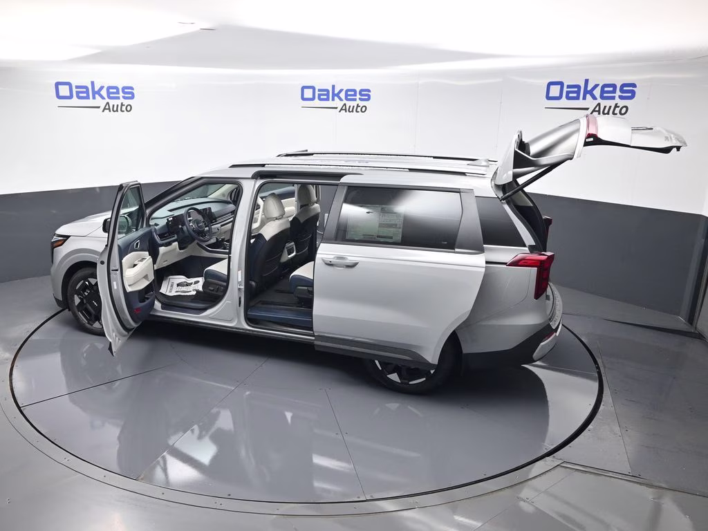 2026 Ceramic Silver Kia Carnival EX FWD Van