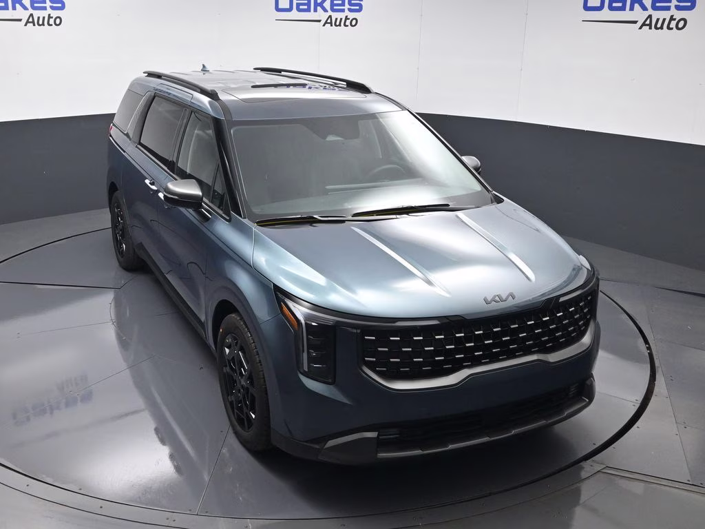 2026 Astra Blue Kia Carnival Hybrid SX FWD Van