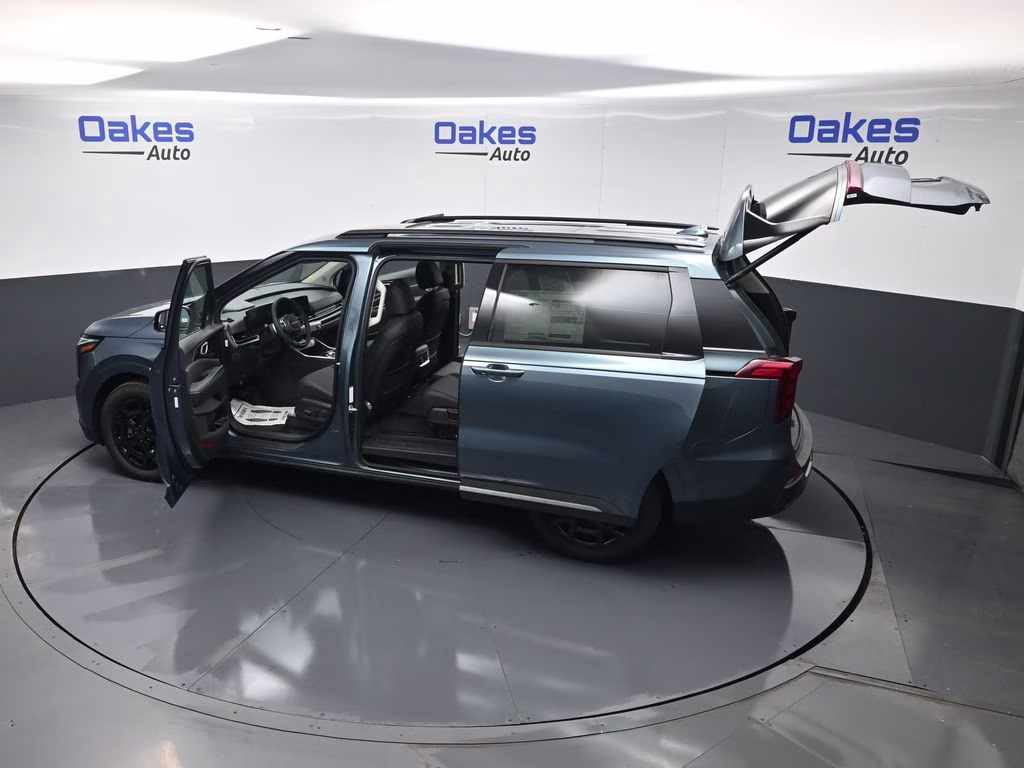 2026 Astra Blue Kia Carnival Hybrid SX FWD Van