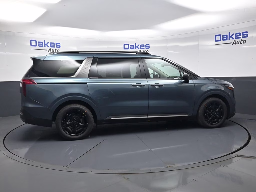 2026 Astra Blue Kia Carnival Hybrid SX FWD Van