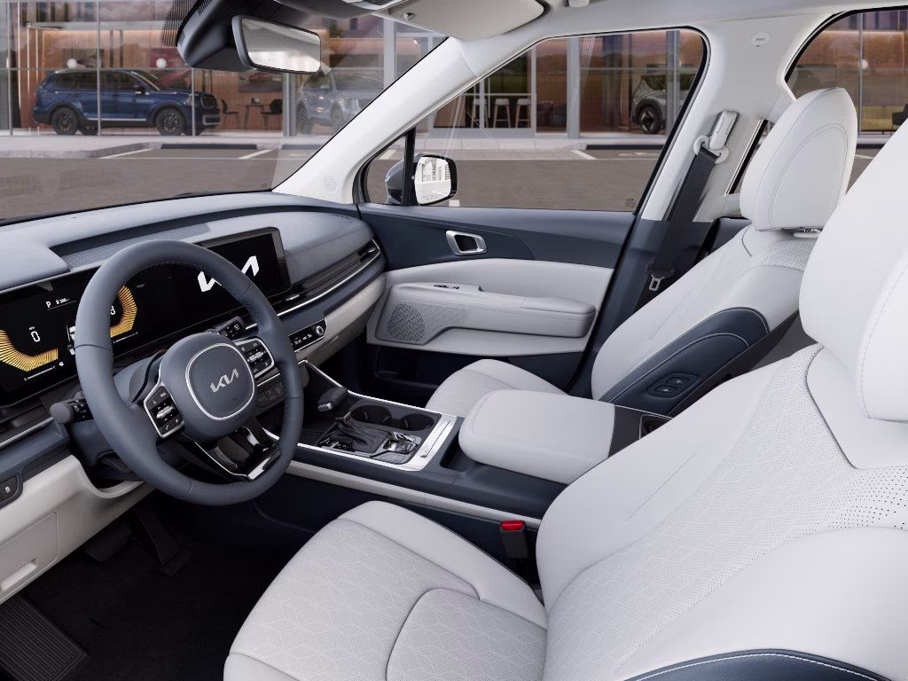 2026 Ceramic Silver Kia Carnival EX FWD Van