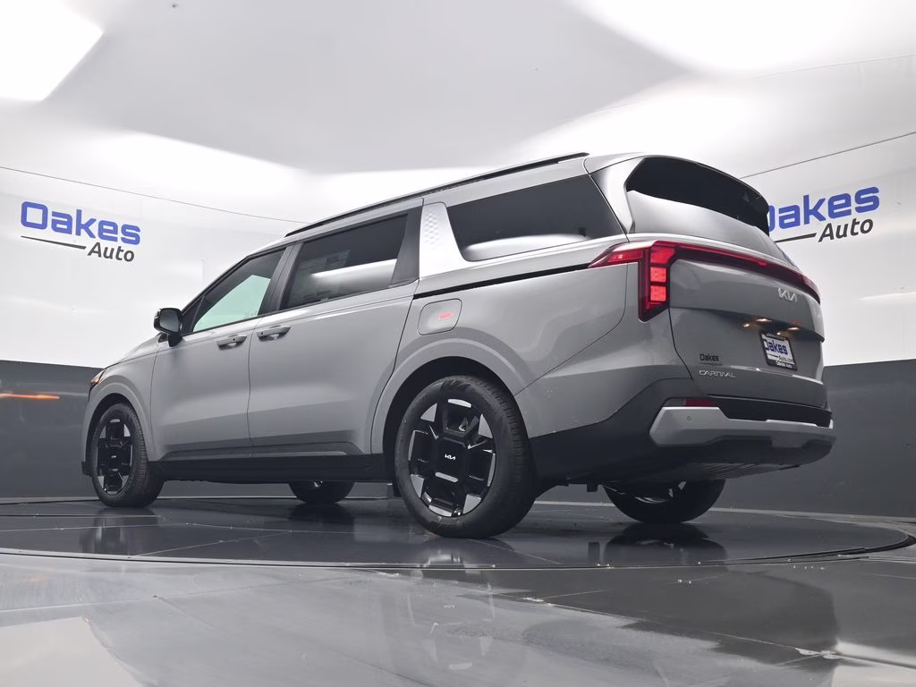 2026 Ceramic Silver Kia Carnival EX FWD Van