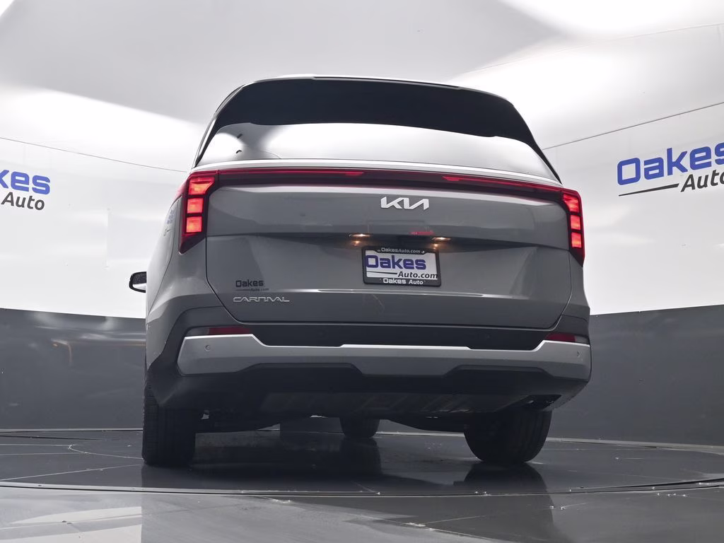 2026 Ceramic Silver Kia Carnival EX FWD Van