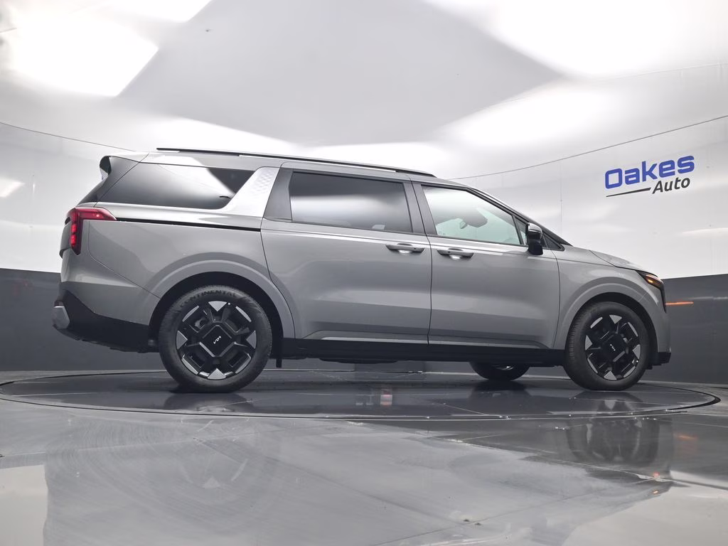 2026 Ceramic Silver Kia Carnival EX FWD Van