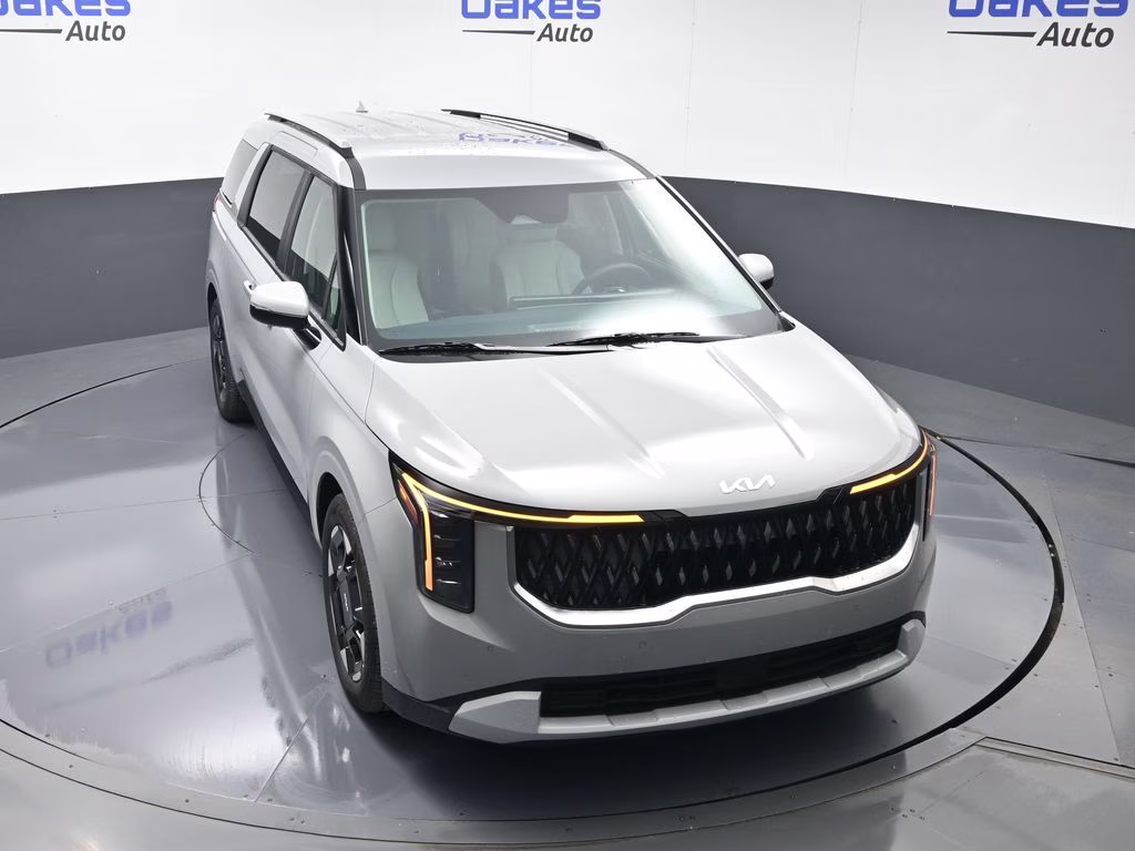 2026 Ceramic Silver Kia Carnival EX FWD Van