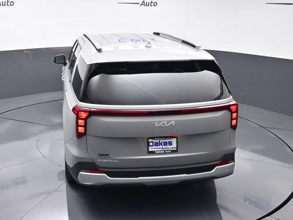 2026 Ceramic Silver Kia Carnival EX FWD Van