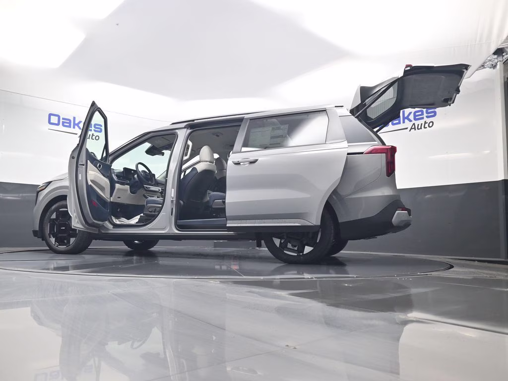 2026 Ceramic Silver Kia Carnival EX FWD Van