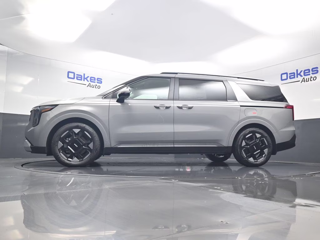 2026 Ceramic Silver Kia Carnival EX FWD Van