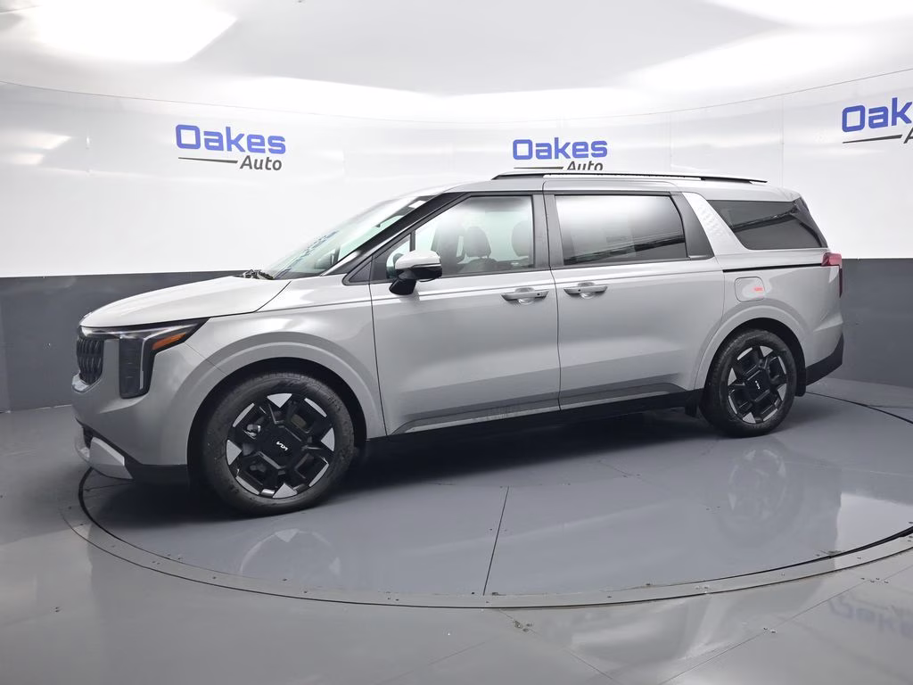 2026 Ceramic Silver Kia Carnival EX FWD Van