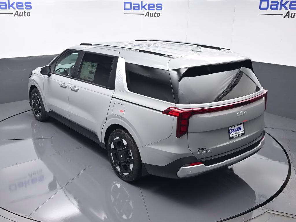 2026 Ceramic Silver Kia Carnival EX FWD Van