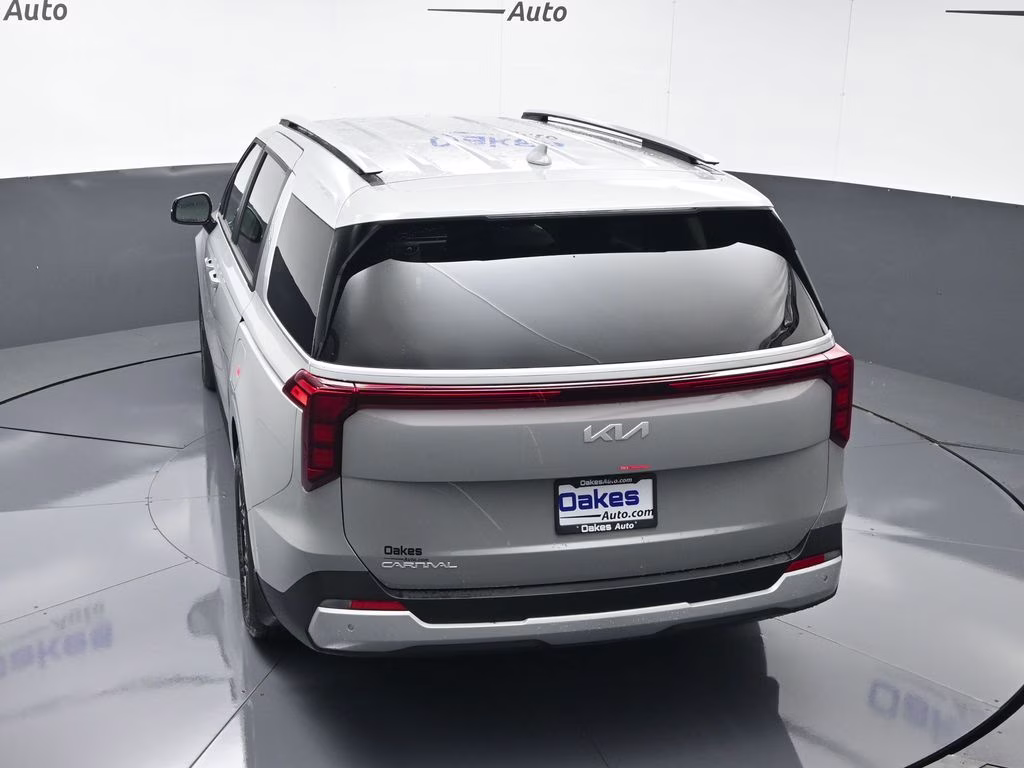 2026 Ceramic Silver Kia Carnival EX FWD Van