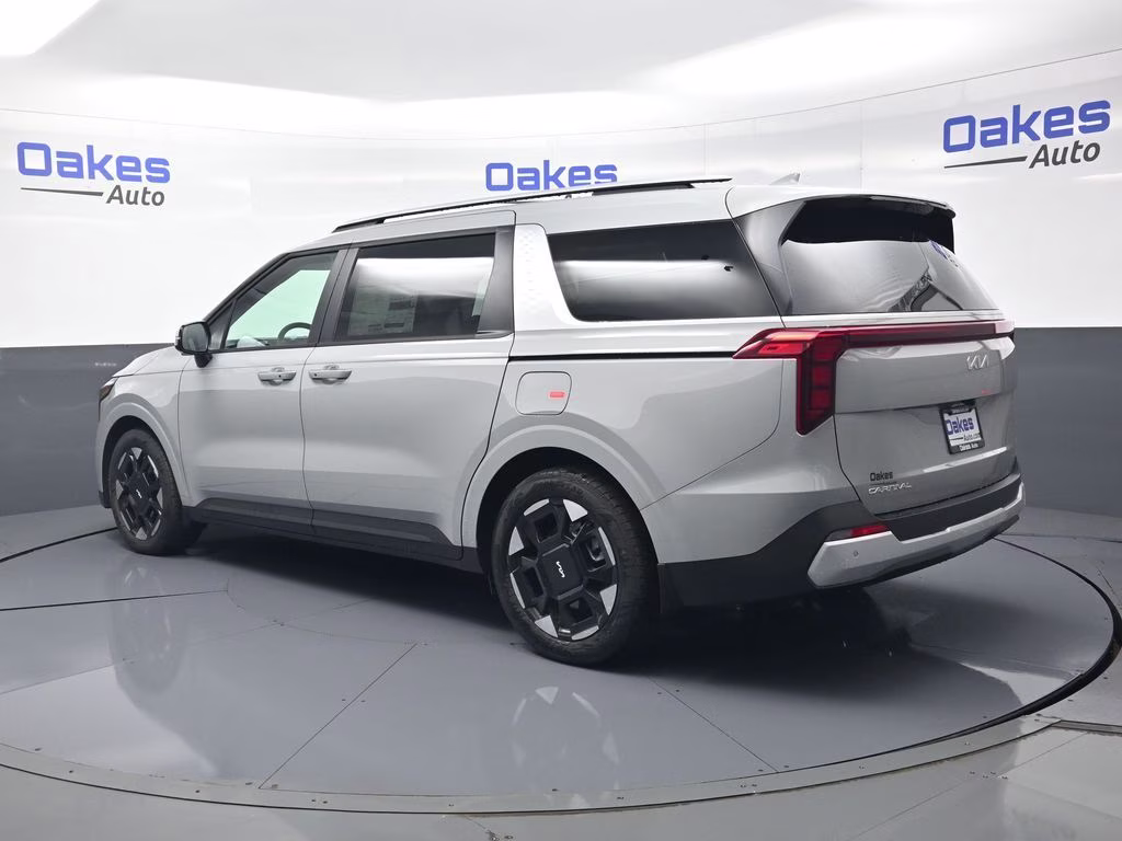 2026 Ceramic Silver Kia Carnival EX FWD Van