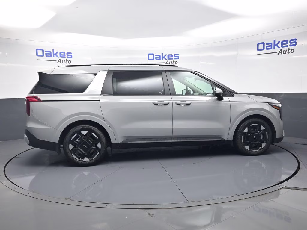 2026 Ceramic Silver Kia Carnival EX FWD Van