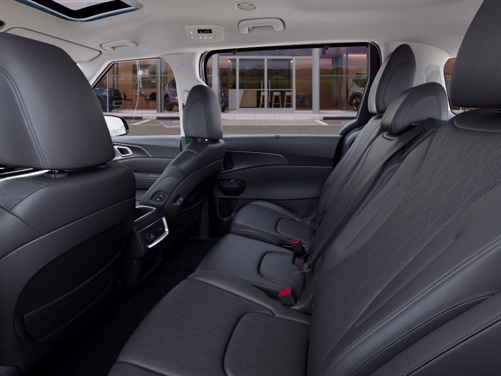 2026 Astra Blue Kia Carnival Hybrid SX FWD Van
