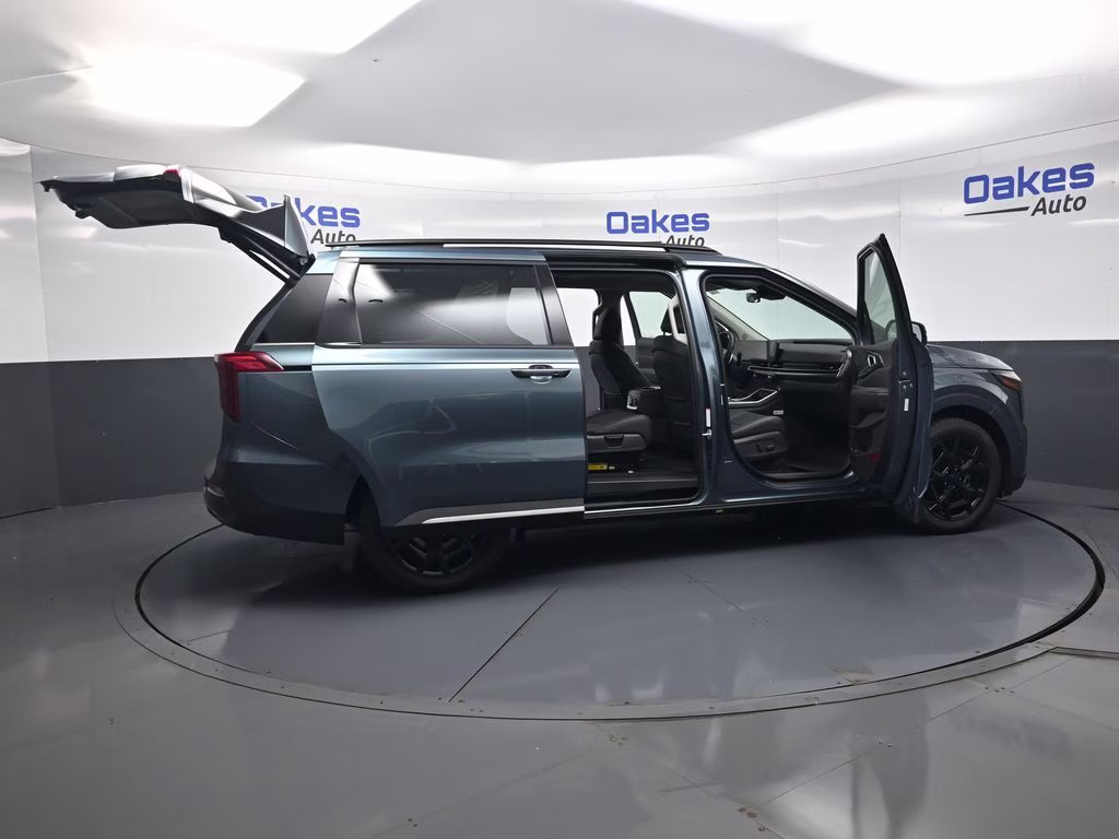 2026 Astra Blue Kia Carnival Hybrid SX FWD Van