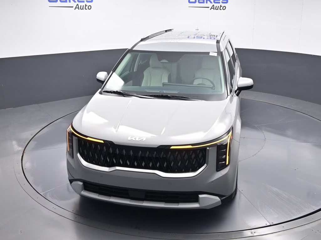 2026 Ceramic Silver Kia Carnival EX FWD Van