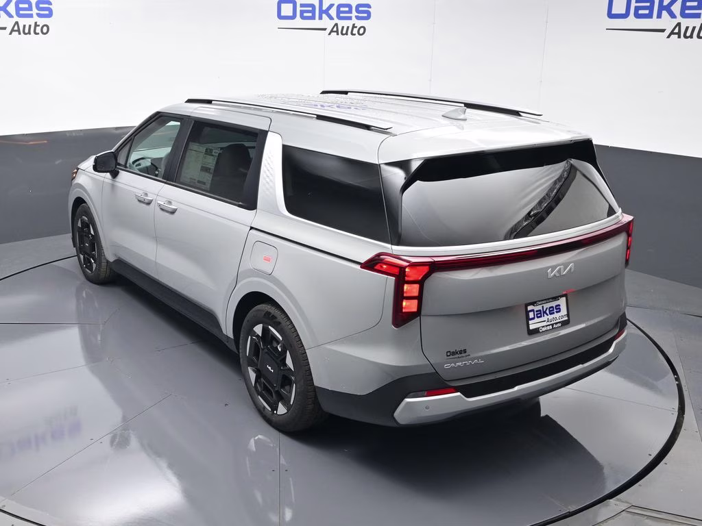 2026 Ceramic Silver Kia Carnival EX FWD Van