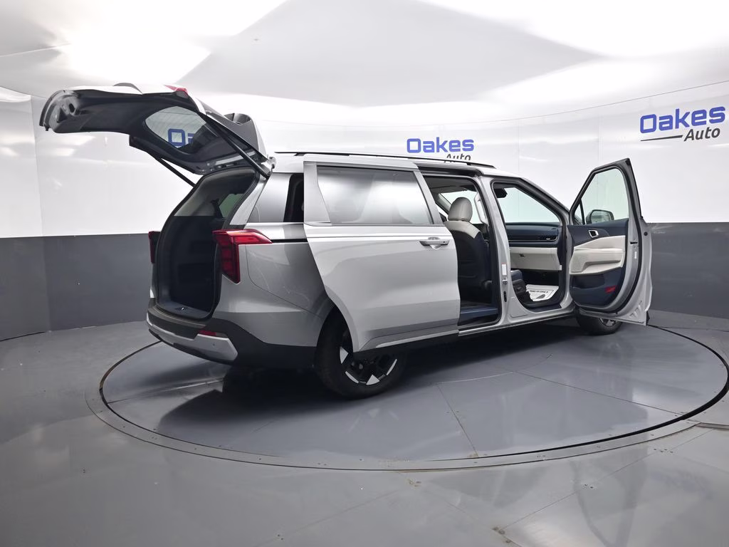 2026 Ceramic Silver Kia Carnival EX FWD Van
