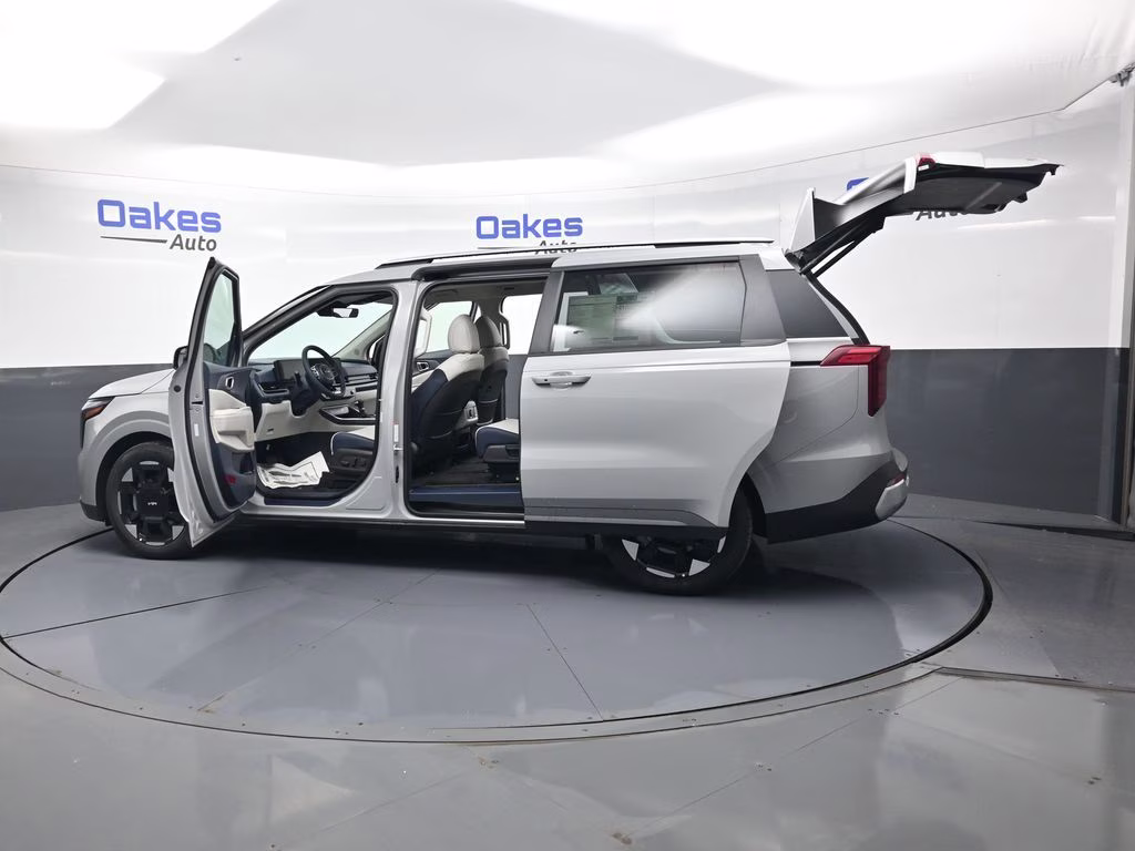 2026 Ceramic Silver Kia Carnival EX FWD Van