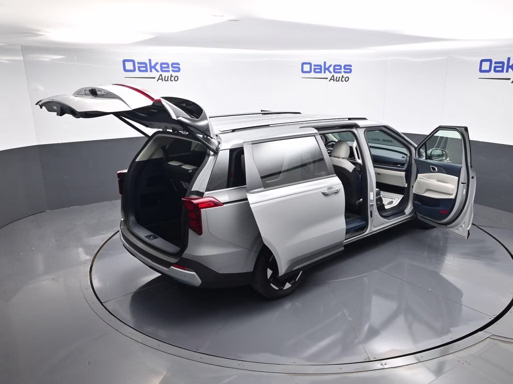 2026 Ceramic Silver Kia Carnival EX FWD Van