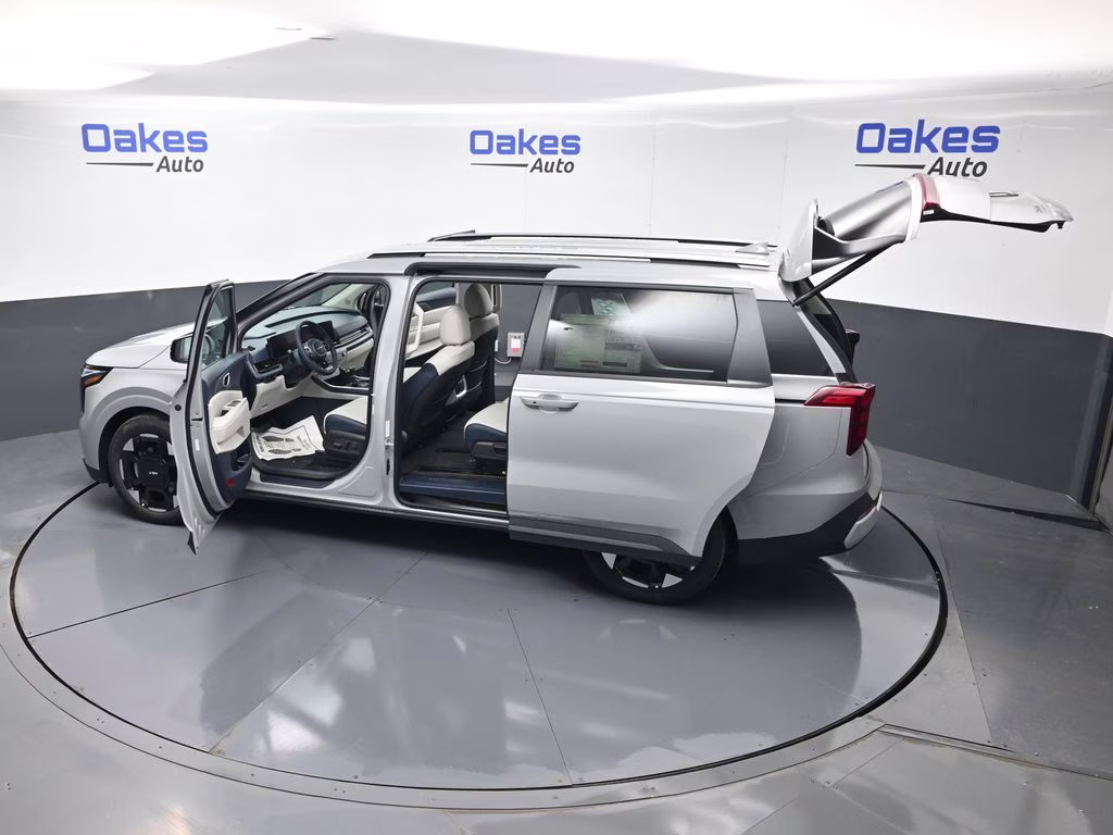 2026 Ceramic Silver Kia Carnival EX FWD Van