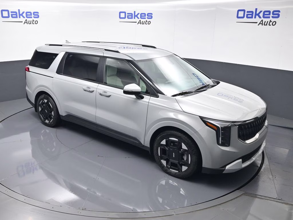 2026 Ceramic Silver Kia Carnival EX FWD Van