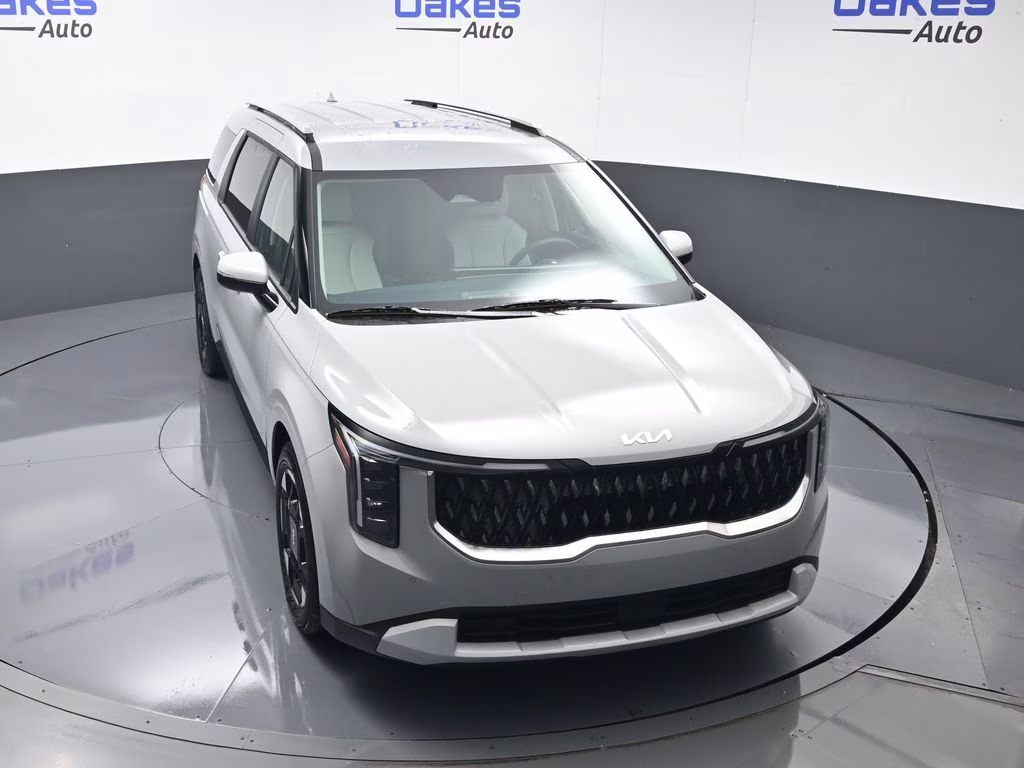 2026 Ceramic Silver Kia Carnival EX FWD Van
