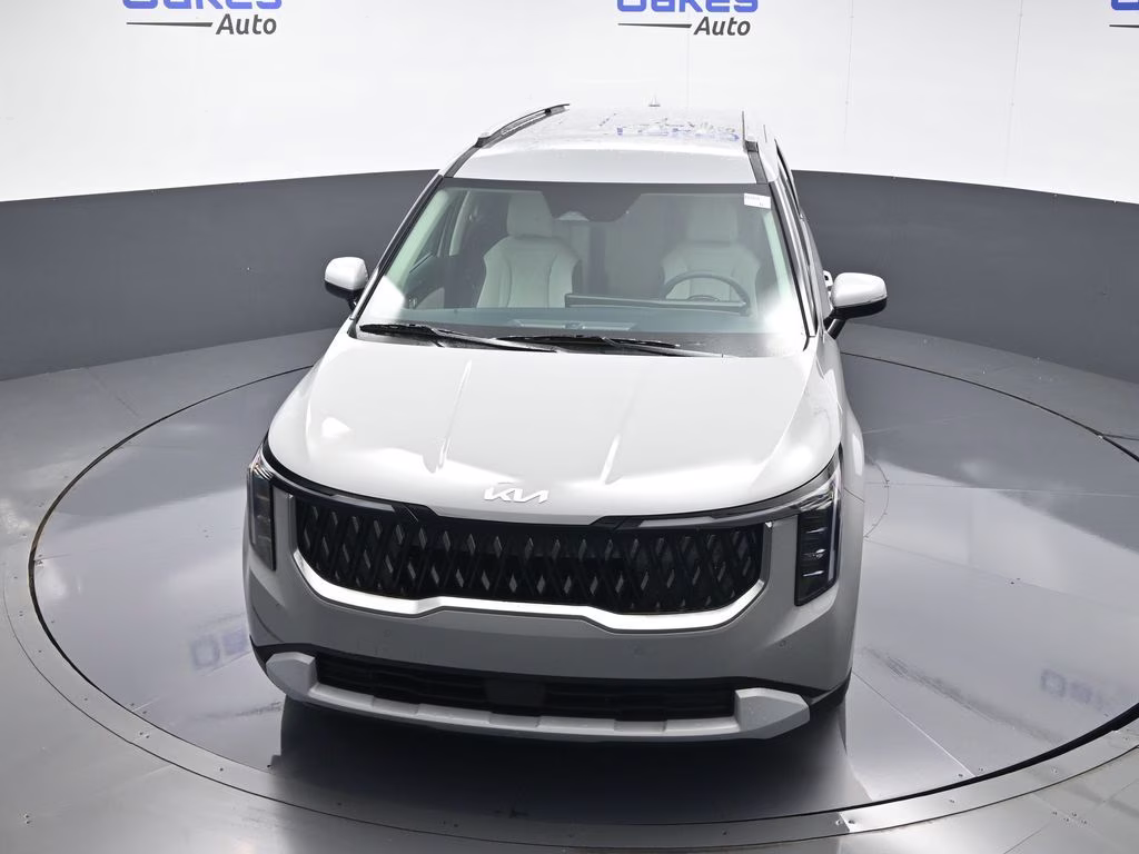 2026 Ceramic Silver Kia Carnival EX FWD Van