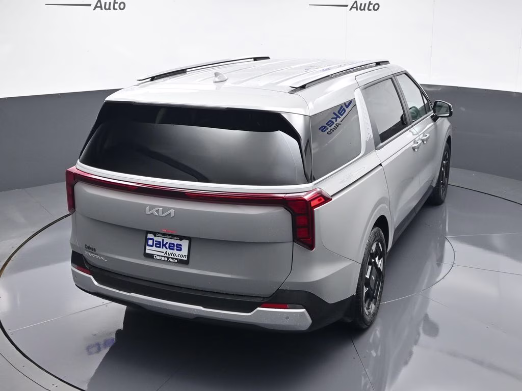 2026 Ceramic Silver Kia Carnival EX FWD Van